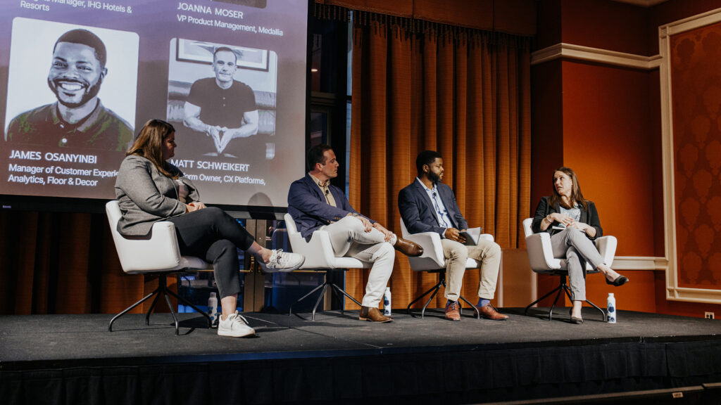 Presenters speak to an audience at Medallia Experience '25