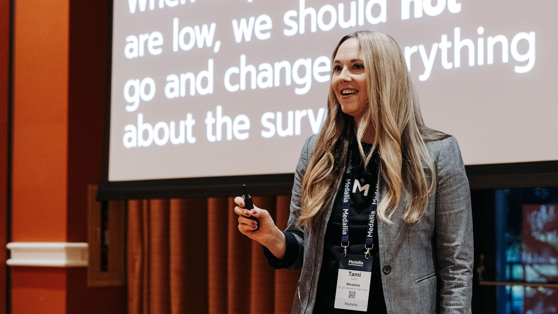 Breakout presenter on stage at Medallia Experience '25