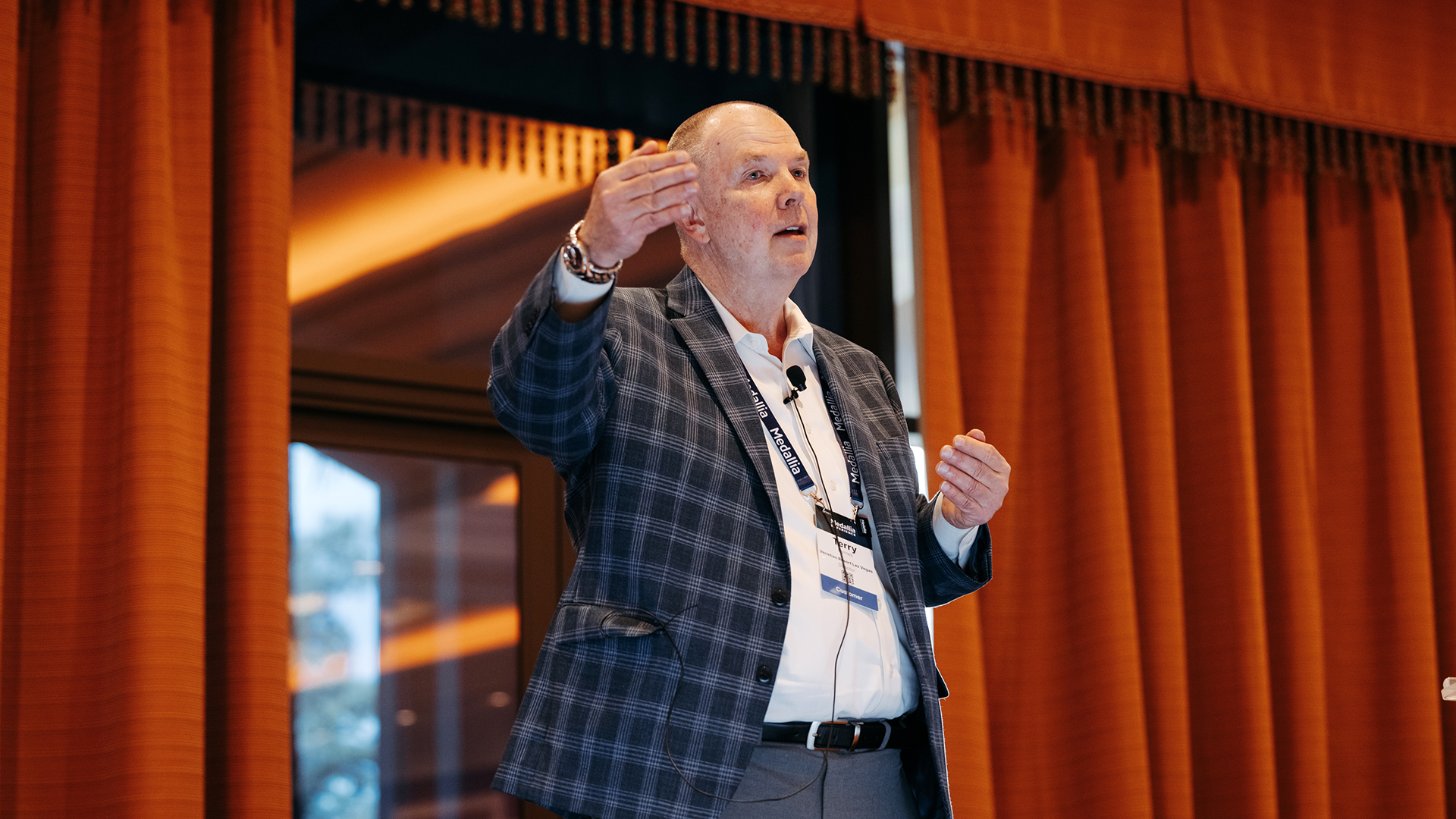 Breakout presenter on stage at Medallia Experience '25