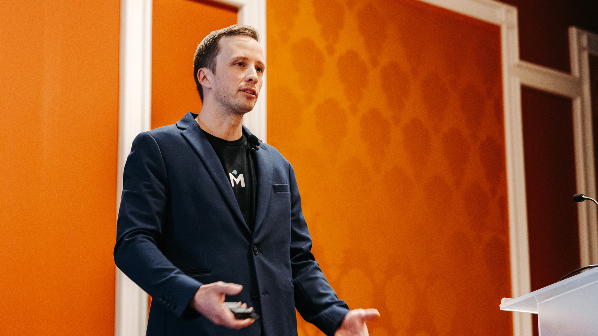 A breakout presenter on stage at Medallia Experience '25