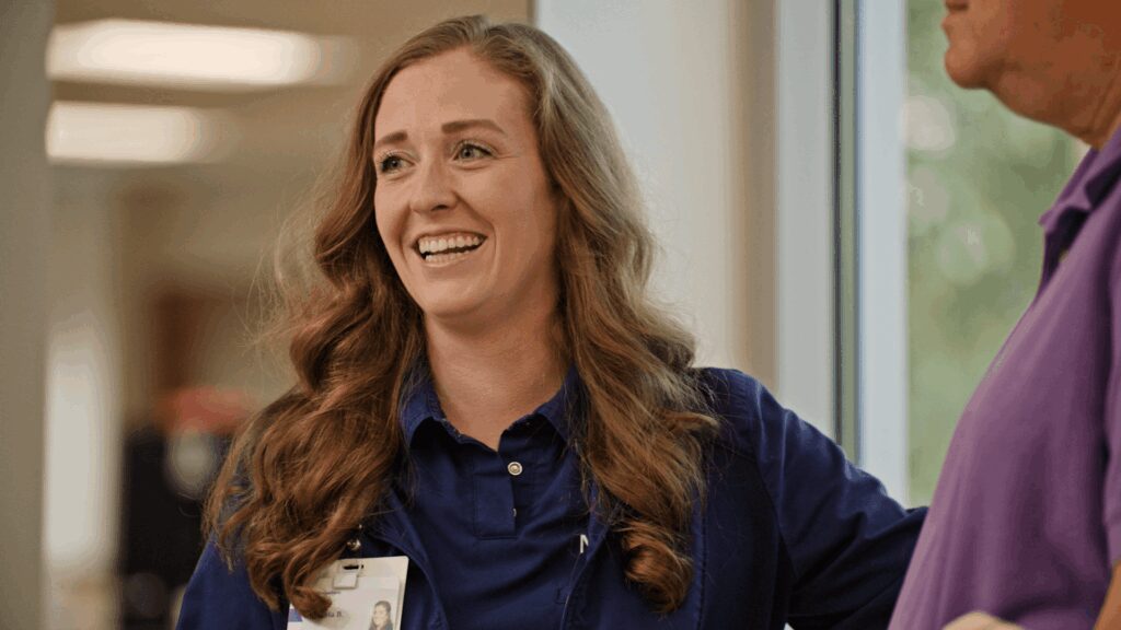 Nurse smiling while at work