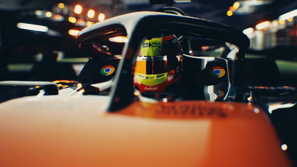 Close up of an F1 driver in the McLaren car.