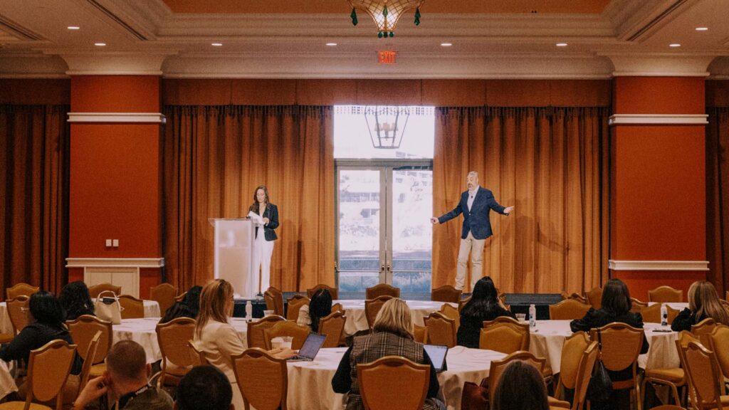 Breakout presenters on stage at Medallia Experience '26