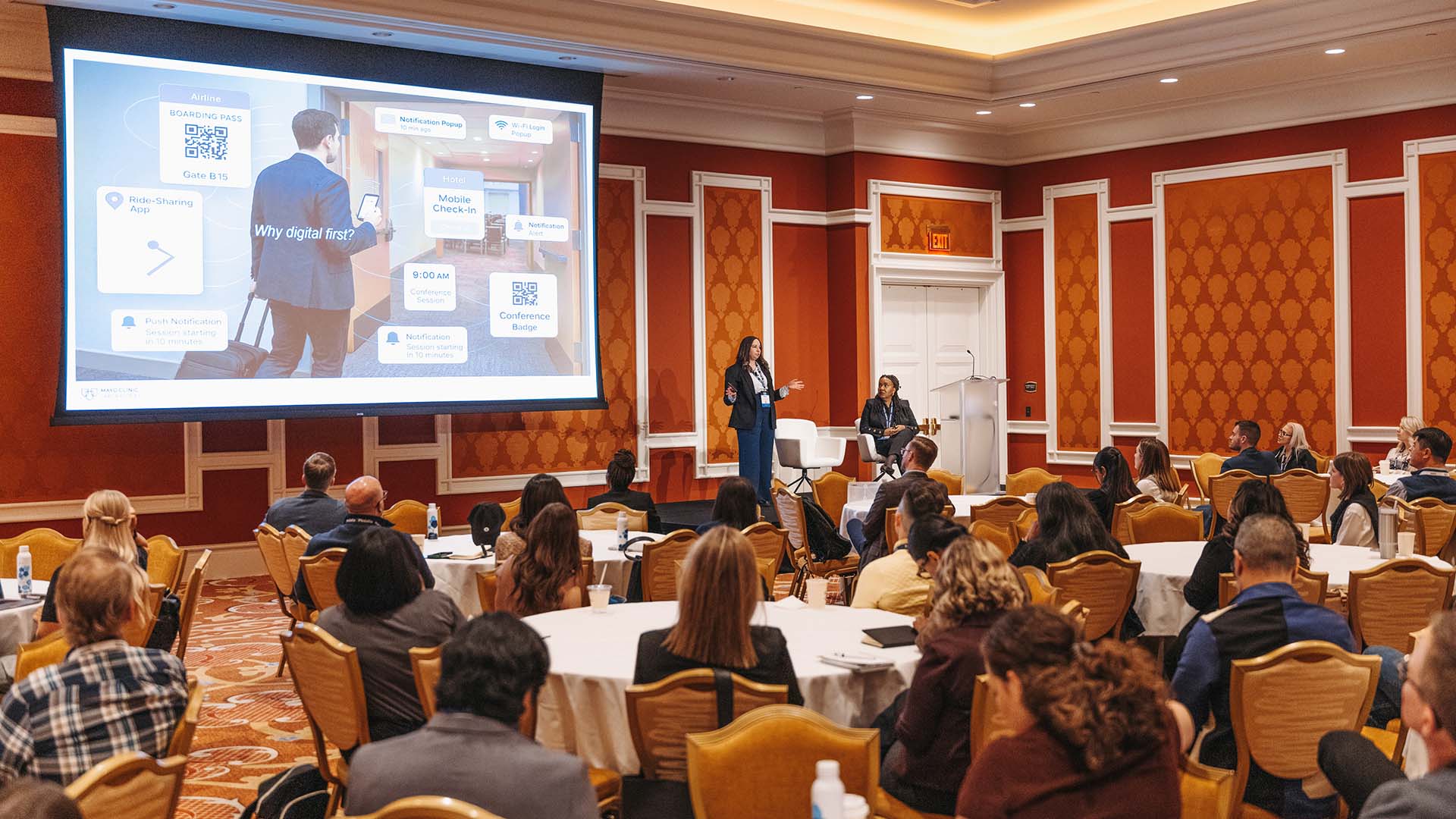 Breakout presenter on stage at Medallia Experience '26