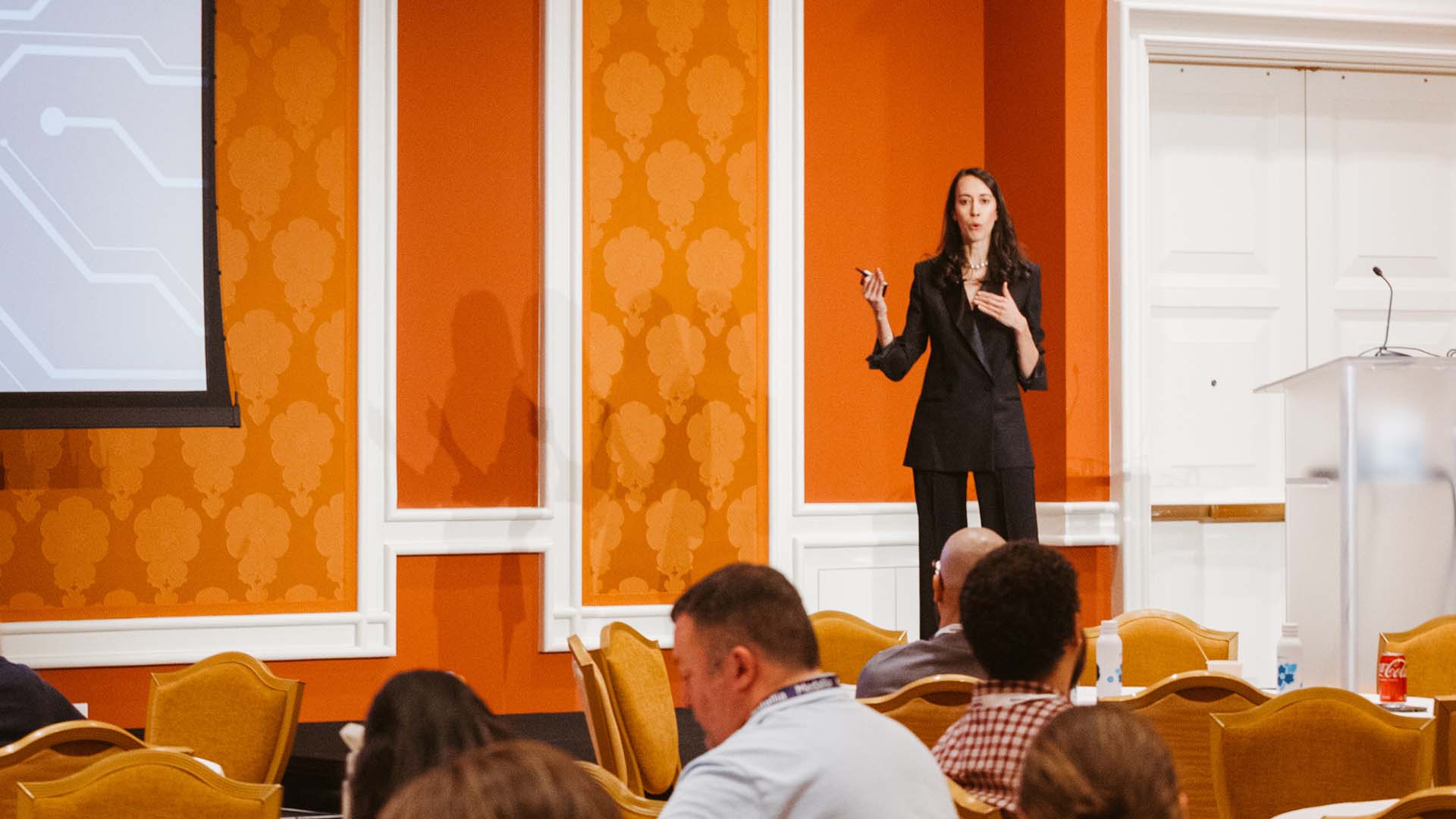 Breakout presenter on stage at Medallia Experience '26.