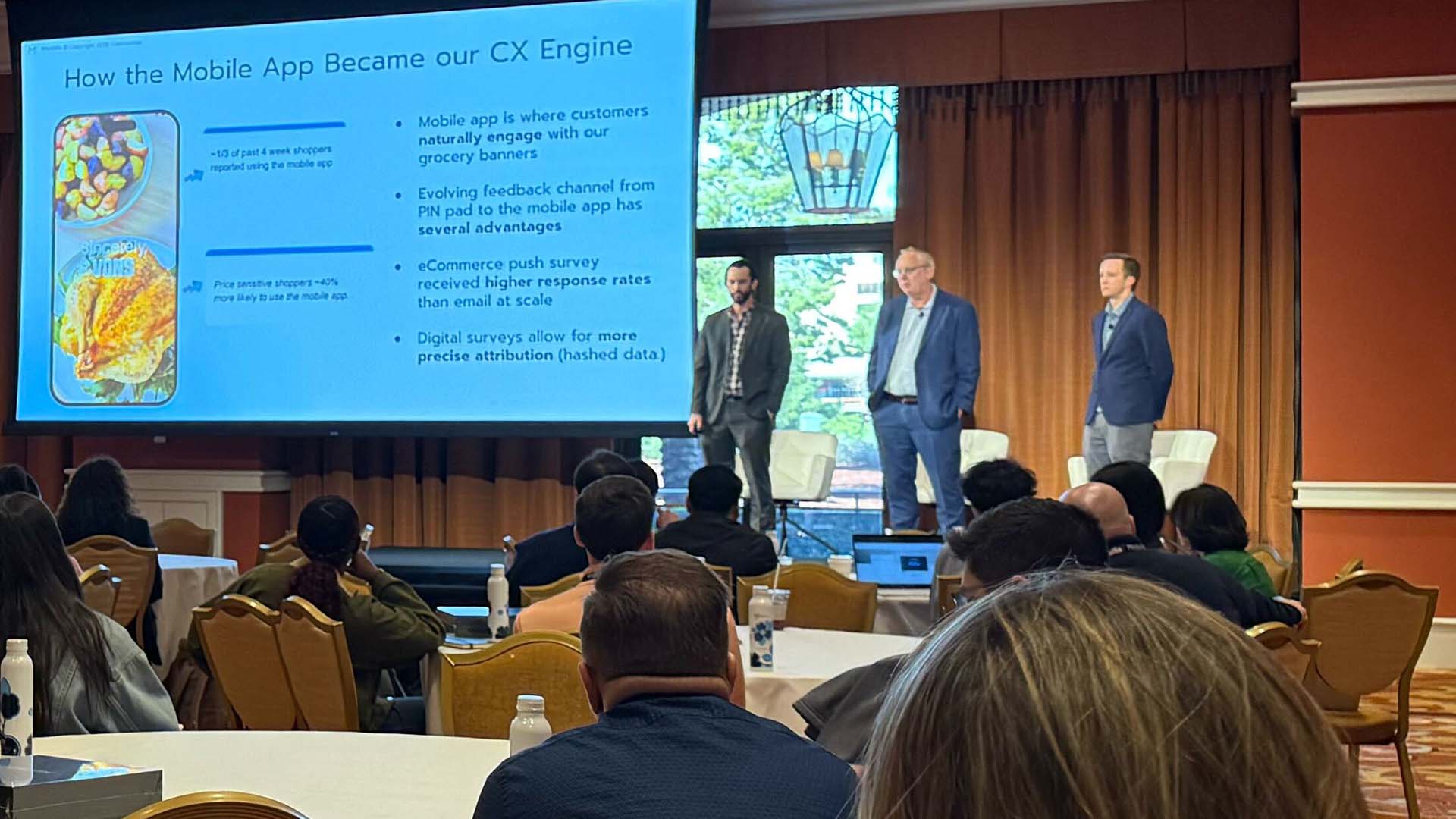 Breakout session presenters on stage at Medallia Experience '26